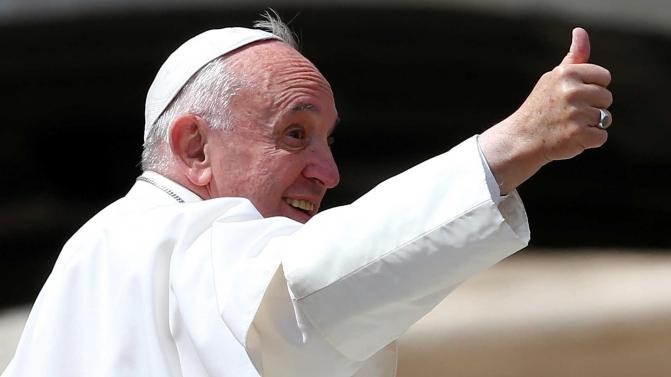 Pope Francis gestures as he leaves at the end of the Wednesday general audience in Saint Peter’s square at the Vatican